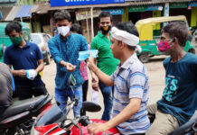 জয়ের আনন্দ ভাগ করে নিতে মাস্ক ও স্যানিটাইজার বিলি